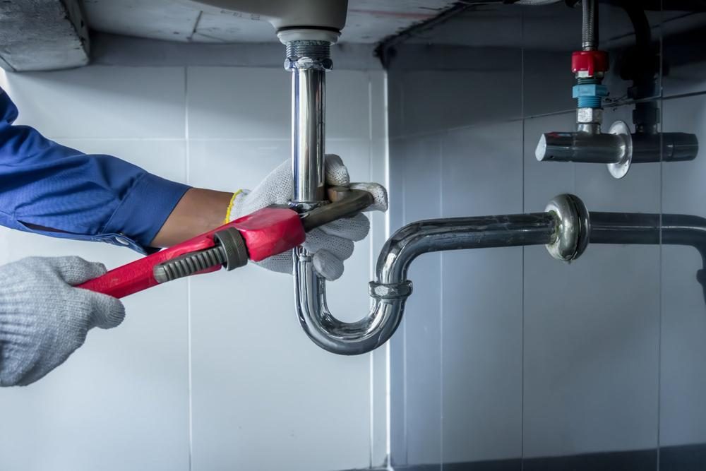 Plumber at work
